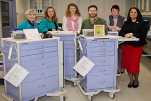 Palliative care week group photo of 6 members