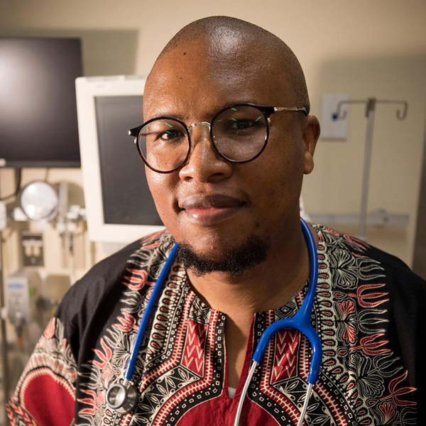 SickKids employee David Rakotsoane standing in a hospital room